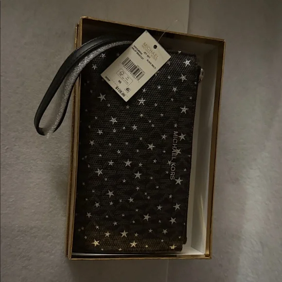 Michael Kors Black and Silver Star Wristlet - Picture 1 of 1